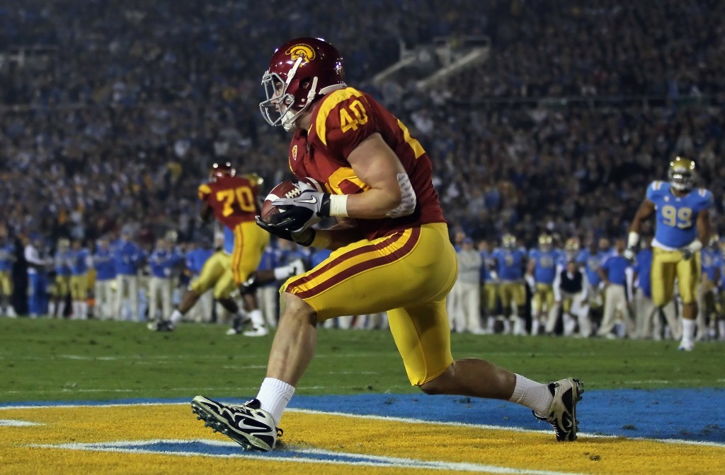 PASADENA, CA - DECEMBER 04: Tight end Rhett Ellison #30 of the USC Trojans catches a pass for touchdown in the first quarter against the UCLA Bruins at the Rose Bowl on December 4, 2010 in Pasadena, California. (Photo by Jeff Gross/Getty Images)
