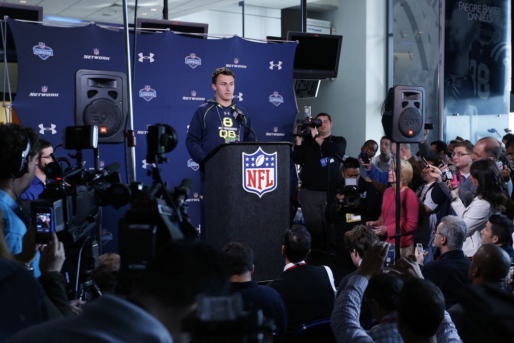 INDIANAPOLIS, IN - FEBRUARY 21: Former Texas A&M quarterback Johnny Manziel speaks to the media during the 2014 NFL Combine at Lucas Oil Stadium on February 21, 2014 in Indianapolis, Indiana. (Photo by Joe Robbins/Getty Images)