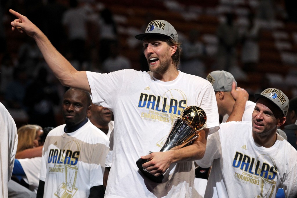 MIAMI, FL - JUNE 12: (L-R) Finals MVP Dirk Nowitzki #41 (holding Bill RUssell Finals MVP trophy) and Jason Kidd #2 of the Dallas Mavericks celebrate after their 105-95 win against the Miami Heat in Game Six of the 2011 NBA Finals at American Airlines Arena on June 12, 2011 in Miami, Florida. NOTE TO USER: User expressly acknowledges and agrees that, by downloading and/or using this Photograph, user is consenting to the terms and conditions of the Getty Images License Agreement. (Photo by Ronald Martinez/Getty Images)