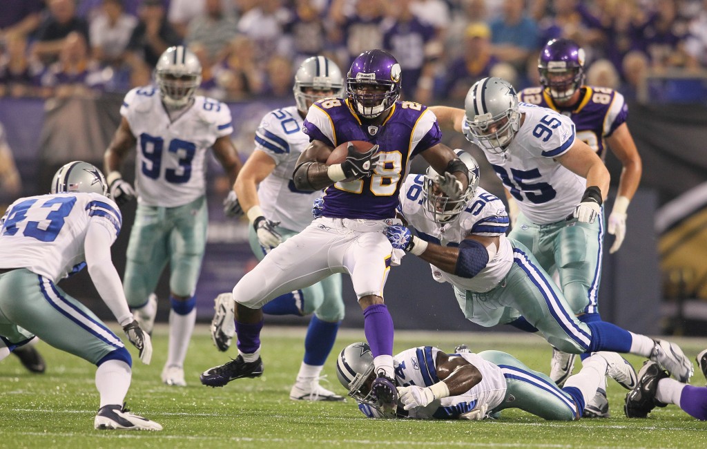 MINNEAPOLIS, MN - AUGUST 27: Adrian Peterson #28 of the Minnesota Vikings advances the ball against the Dallas Cowboys during their pre-season game at Mall of America Field on August 27, 2011 in Minneapolis, MN. (Photo by Adam Bettcher /Getty Images)
