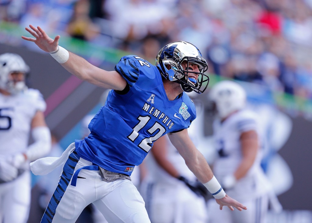 MIAMI, FL - DECEMBER 22: Paxton Lynch #12 of the Memphis Tigers reacts after throwing a touchdown pass during the first quarter of the game against the Brigham Young Cougars at Marlins Park on December 22, 2014 in Miami, Florida. (Photo by Rob Foldy/Getty Images)
